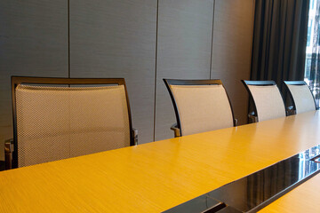 Beautiful modern table with chairs in the meeting room.