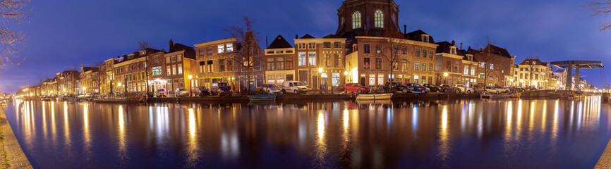 Fototapeta na wymiar Panorama of the city embankment in Leiden at sunrise.