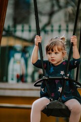 portrait of a child on the playground in lisbon portugal 