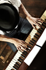 The makings of a creative genius. High-angle view of a young musician playing the piano.