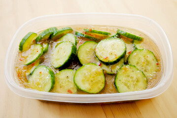  Sliced Cucumbers Marinated in Italian Dressing for a Healthy Snack