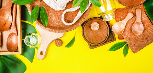 Recycling concept.Set of empty reusable,disposable eco-friendly plates, on yellow background.Ecological tableware made of natural materials.Life without Plastic.Eco friendly disposable tableware.