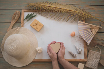 Man hand holding with heart gift box. Travel concept. Summer time. Travel concept. Happy day