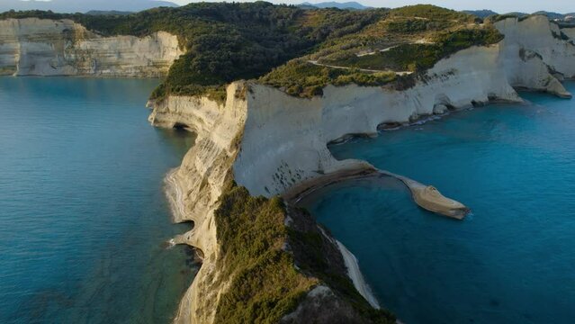 Drone Over Coastline Cliffs And Sea At Sunrise Of Cape Drastis