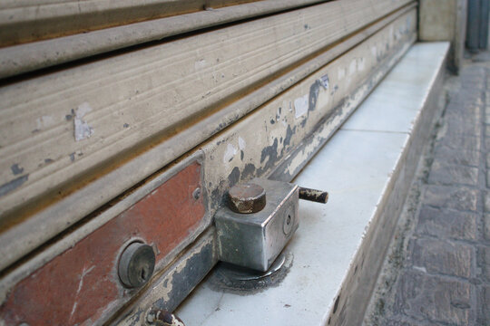 Close-up Of The Shutter Of A Closed Commercial Premises