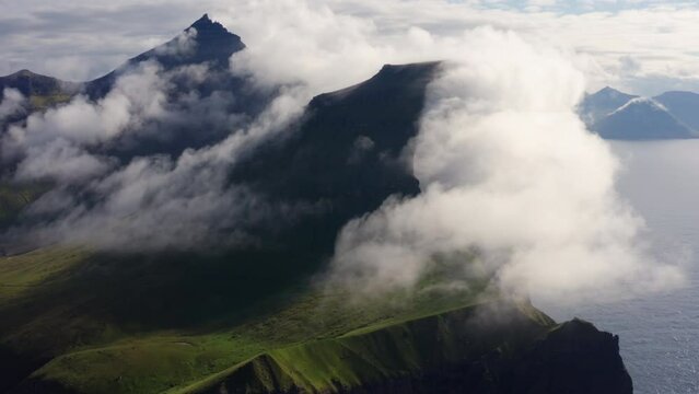 Drone Towards Misty Kalsoy Island Covered In Clouds And Mist