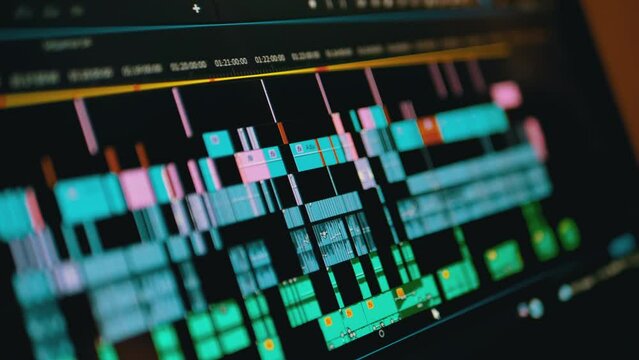 Correction, Editing Audio Layers Played on the Soundtrack on a Computer Screen. Movement adjustment layer pocket. Graph, tracks. Work in application on a laptop with music files in a recording studio.