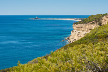 A photo of Trafalgar Lighthouse and Cliffs of Barbate and Barbate Beach in Cadiz, Spain