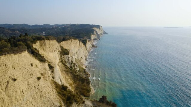 Drone Over Coastline Cliffs And Sea At Sunrise Of Cape Drastis