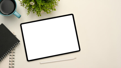 Simple white workspace background with digital tablet