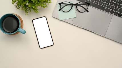 Top view, Simple white workspace background with smartphone mockup.
