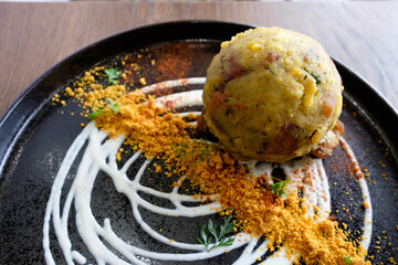 Bolon de verde con sal prieta.