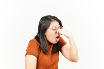 Fototapeta premium Smelling something stinky and disgusting Of Beautiful Asian Woman Isolated On White Background