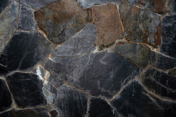 Wall texture stone plated gray color, mosaic background, rock texture