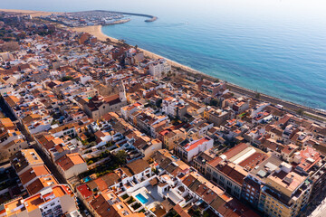 Bird's eye view of coastal town Premia de Mar in comarca of Maresme, Catalonia, Spain. - obrazy, fototapety, plakaty
