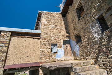 old destroyed housing abandoned by refugees