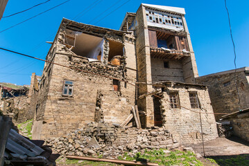 old destroyed housing abandoned by refugees
