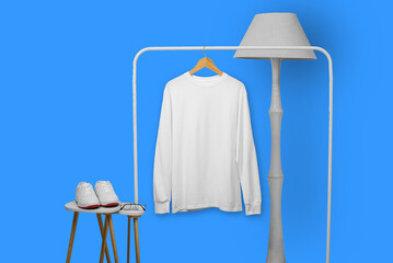 White long sleeve t-shirt on wooden hanger with display property