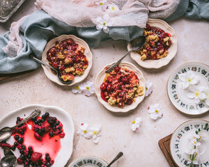 Berry crumble being served - horizontal flat lay 