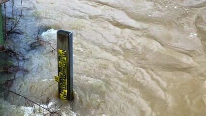 at a water level meter standing in the river, you can read the water level at high water