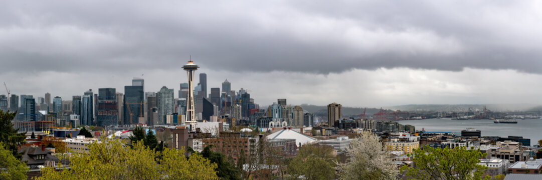 The Seattle, Washington Skyline Seen In Spring Time With Clouds In The Background Of The City Skyscrapers. 