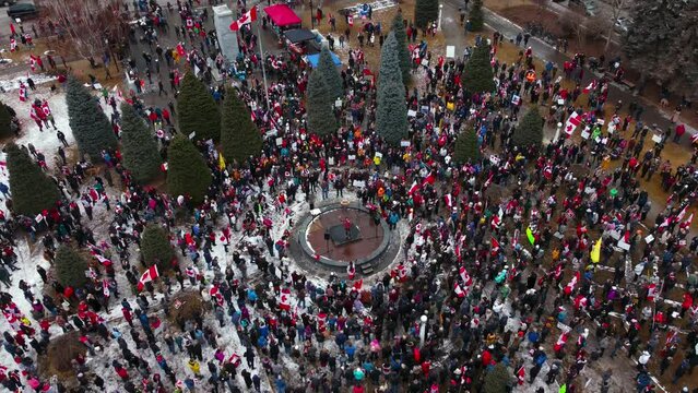 Crowd with speaker pull out wide shot Calgary Protest 12th Feb 2022