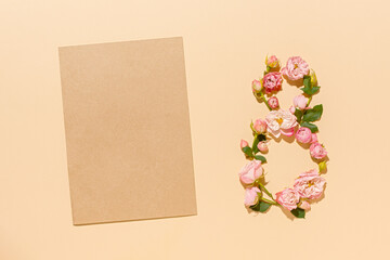 International Women's Day. Flower composition 8. Creative date. Heads of delicate roses on a light...