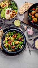 Vegan dishes assortment on light background.