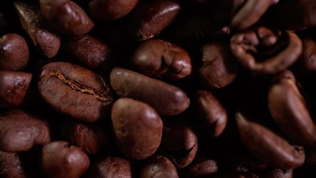 Coffee beans are stirred in the process of roasting..