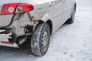 A close-up of the wing of the car was broken at the rear. Missing rear bumper car after an accident...
