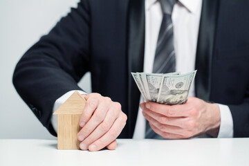 Property scam concept. Scam with real estate. Cheating when buying or renting a house. Risks and...
