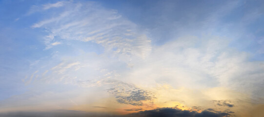 Sky. Nature background with sunset sky with sun and white clouds