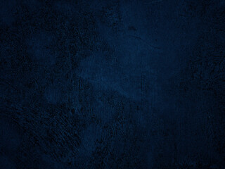Dark rough cement wall background for graphic design or wallpaper.