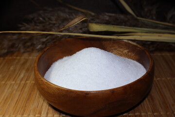 EDTA 4Na - trilon in the form of crystals is poured into a wooden plate