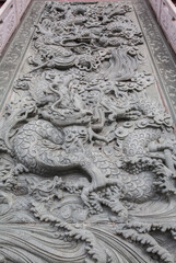 Dragon craving at Wat Borom Racha Kanjanapisek Anusorn, is Chinese temple spiritual complex with brightly painted shrines with golden seated Buddha