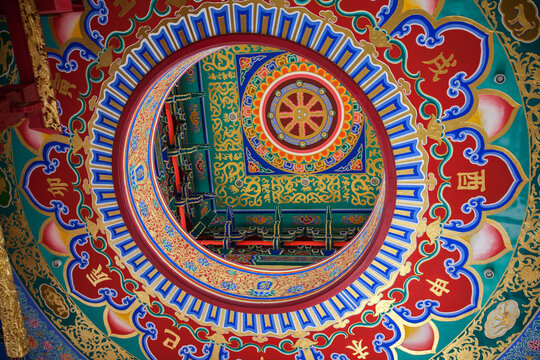 Decoration of Wat Borom Racha Kanjanapisek Anusorn, is Chinese temple spiritual complex with brightly painted pagoda and shrine with golden seated Buddha