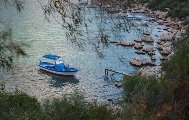 Obraz na płótnie Canvas Small fishing boats at sunset time - Kas Turkey