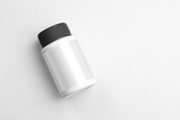 Bottle mockup on white background. Medicine plastic package for pills, vitamins or capsules. Vector empty jar, container mock up.