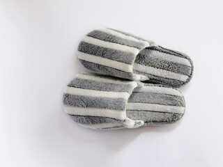 Empty pair of white and gray house slippers. design prototype Slippers in the house mock up the top view of the template. Transparent sandals in the country. Shoes bed, shoe accessories.