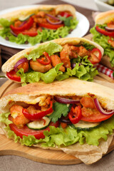 Concept of tasty food with pitas with chicken meat