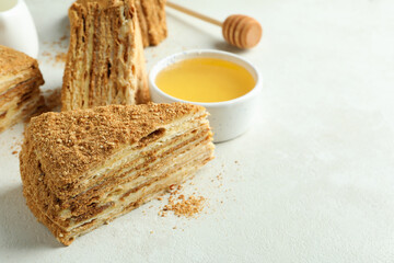 Concept of tasty food with honey cake, space for text