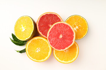 Fototapeta na wymiar Citrus fruits on white background, top view