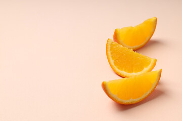 Orange slices on soft background, space for text