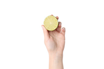 Female hand holds lime half, isolated on white background © Atlas