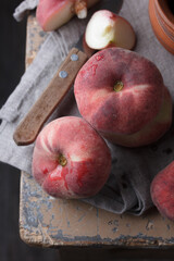 Peaches on an old rustic table