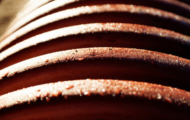 large orange plastic pipe for road construction close up