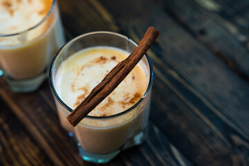 Yellow Indian mango yoghurt drink Mango Lassi or smoothie with turmeric and saffron.