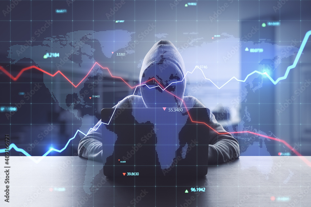 Fototapete Hacker at desktop using computers with creative glowing blue map hologram with chart and grid on blurry office interior background. Economy, hacking, world and stock concept. Double exposure.