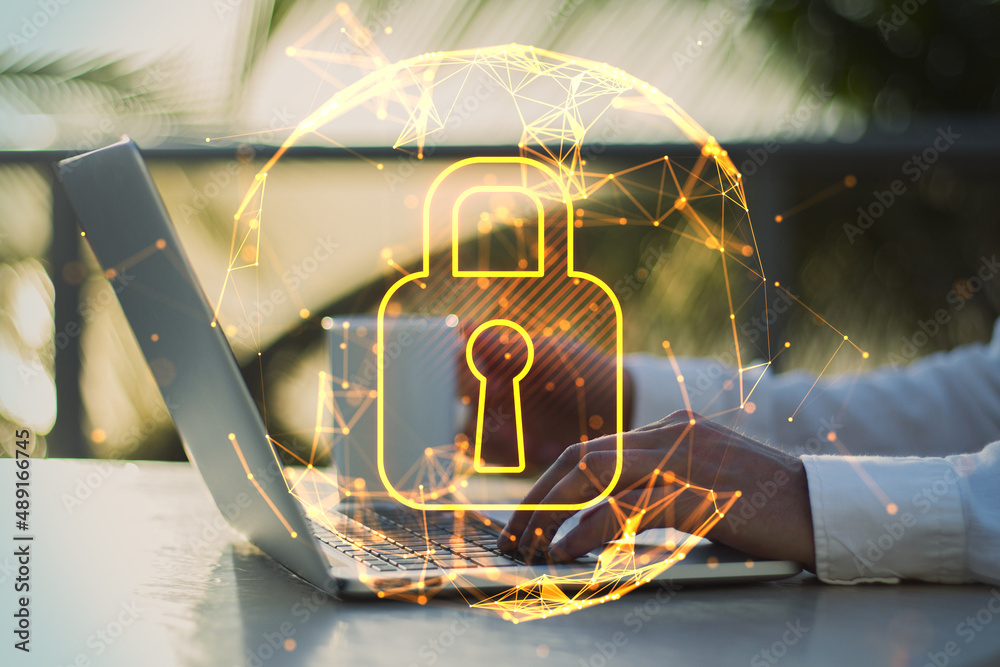 Poster Close up of businessman hands using laptop with abstract glowing polygonal sphere with glowing digital padlock on blurry outdoor background. Safety, protect and technology concept. Double exposure.