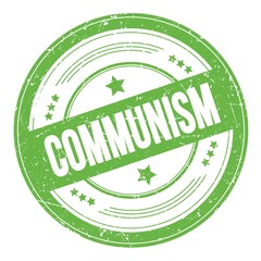COMMUNISM text on green round grungy stamp.